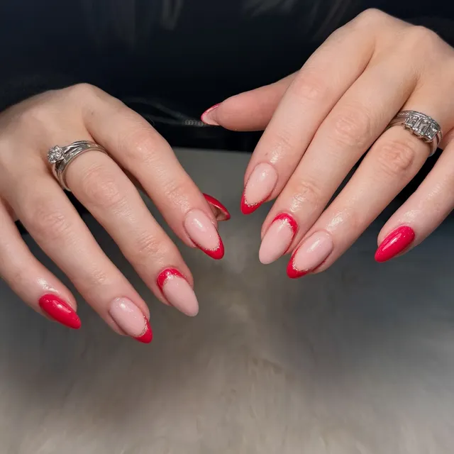 Red-tip french on natural almond nails
