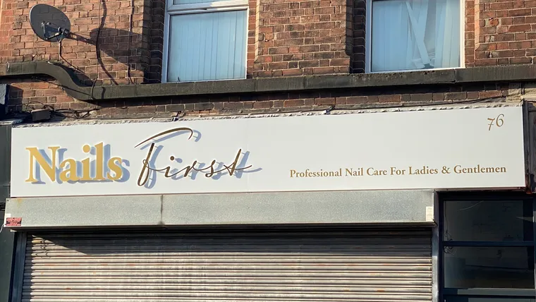 The Nails First shopfront on St Mary’s Road, Garston — white fascia with gold lettering reading 'Professional Nail Care For Ladies & Gentlemen'